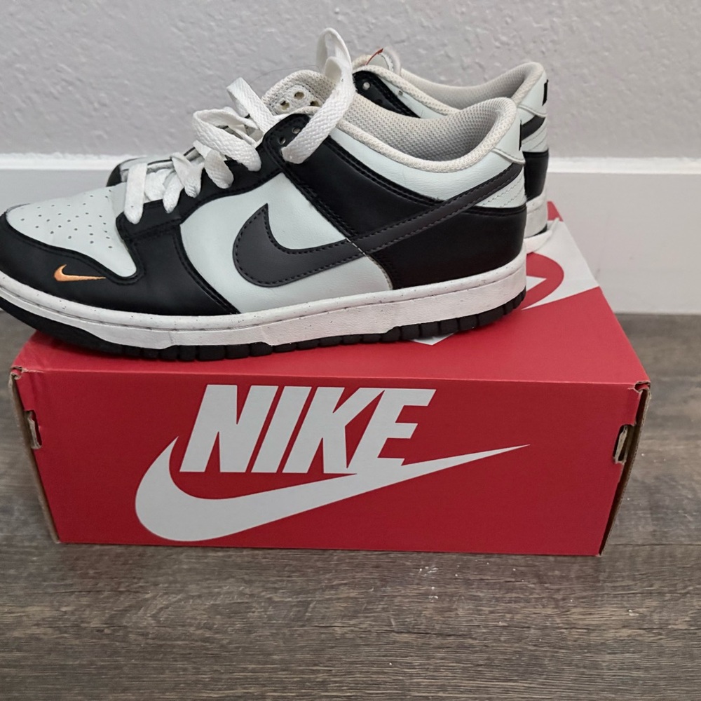 Nike Kids Black and White Sneakers with Orange Accent